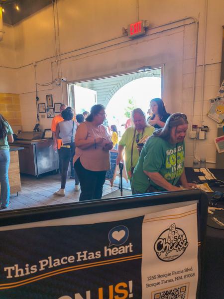 Attendees of the HEART free lunch arrive and start to enjoy the event